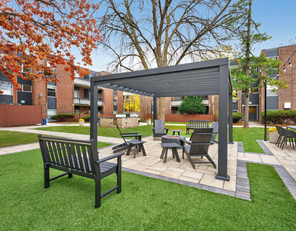 Fire fits and seating area at Eagle Rock Apartments & Townhomes at Brighton in Brighton, Massachusetts