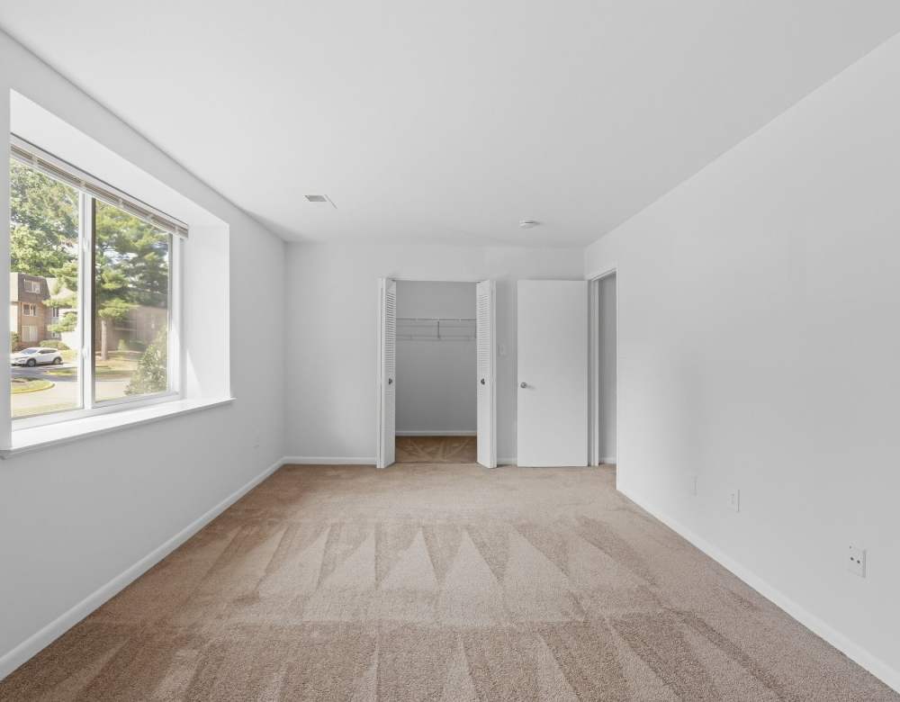 Spacious bedroom with natural light at Fairway Apartments in Reston, Virginia
