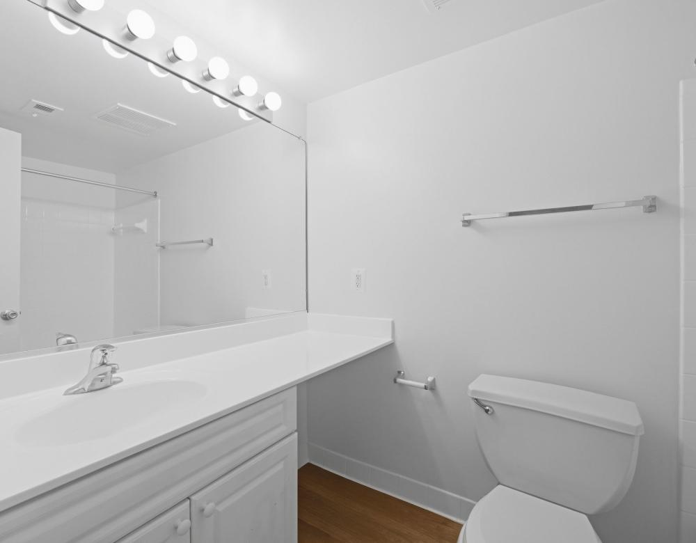 Bright bathroom with modern fixtures at Fairway Apartments in Reston, Virginia