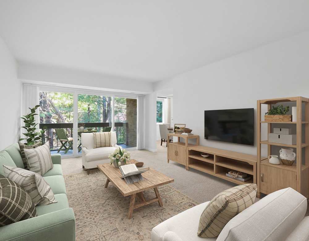 Spacious living area with natural light at Fairway Apartments in Reston, Virginia
