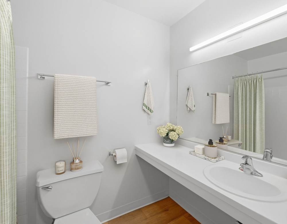 Bright bathroom with modern fixtures at Fairway Apartments in Reston, Virginia