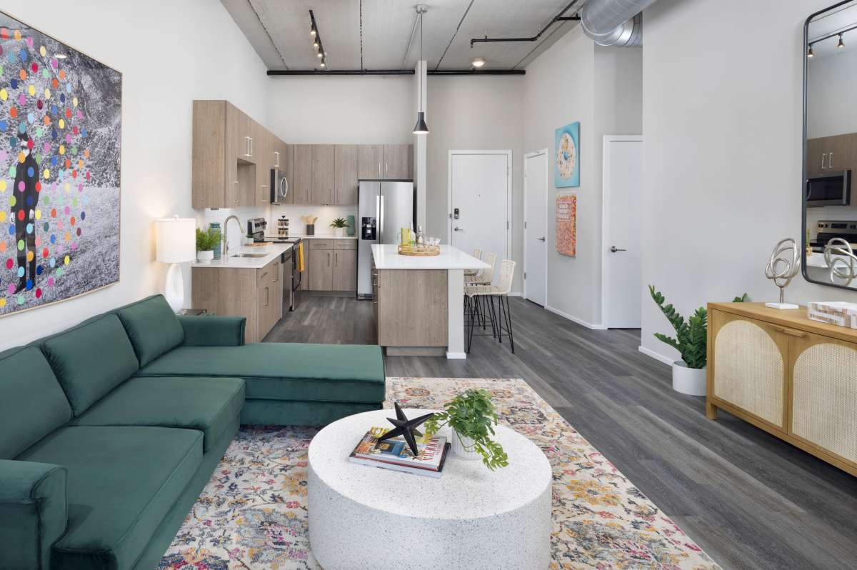 Combined view of the living room and kitchen at RainDance in Winter Haven, Florida 