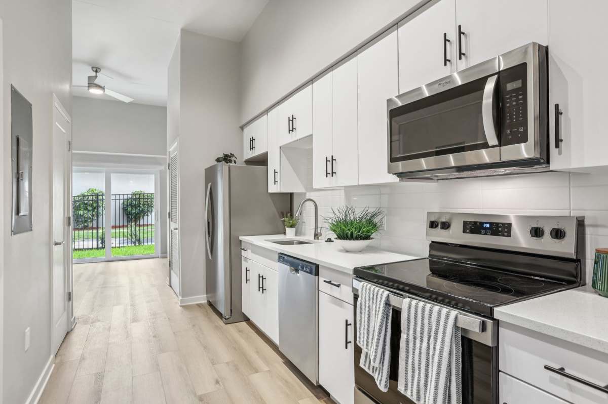 Kitchen with dishwasher at The Breeze in Winter Haven, Florida