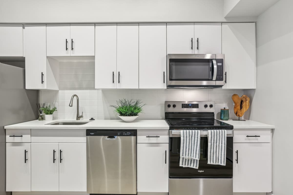 Kitchen with dish wash sink at The Breeze in Winter Haven, Florida