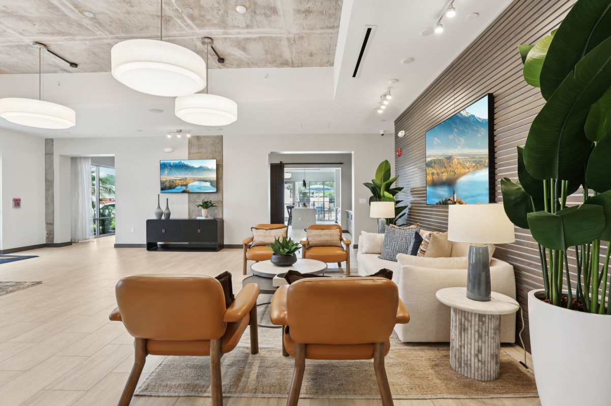 Clubhouse with large television at The Breeze in Winter Haven, Florida