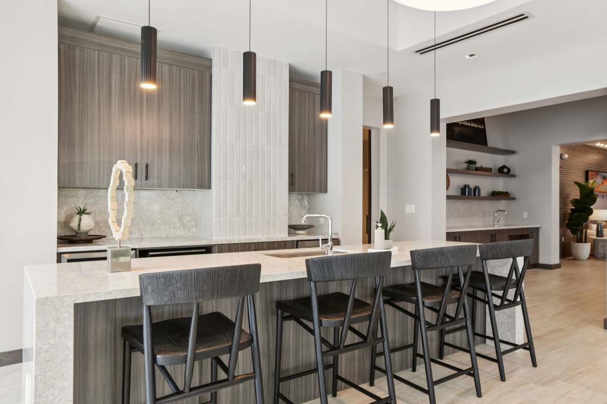 Clubhouse cafe area with island at The Breeze in Winter Haven, Florida