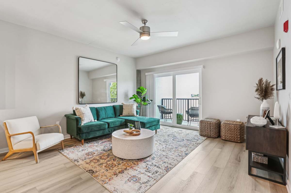 Living room with coffee table and sofa at The Breeze in Winter Haven, Florida