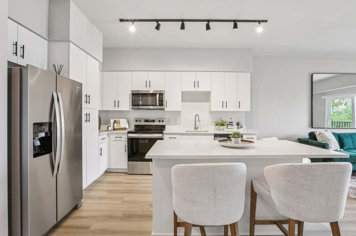 Kitchen with side-by-side referigator at The Breeze in Winter Haven, Florida