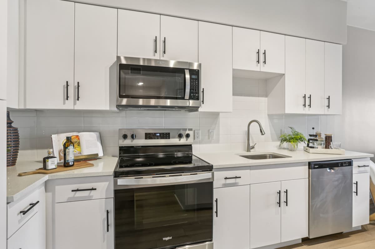 Kitchen with stainless-steel appliances at The Breeze in Winter Haven, Florida