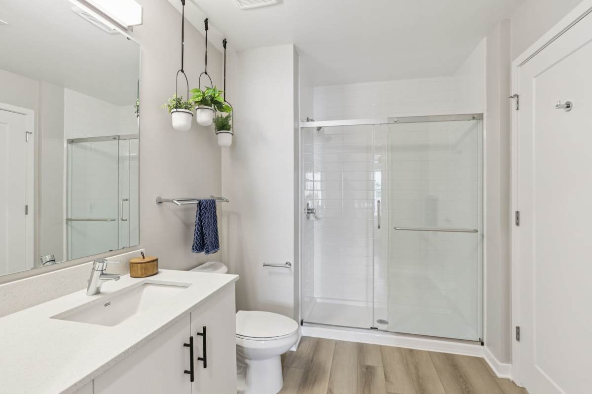Bathroom with walk-in shower at The Breeze in Winter Haven, Florida