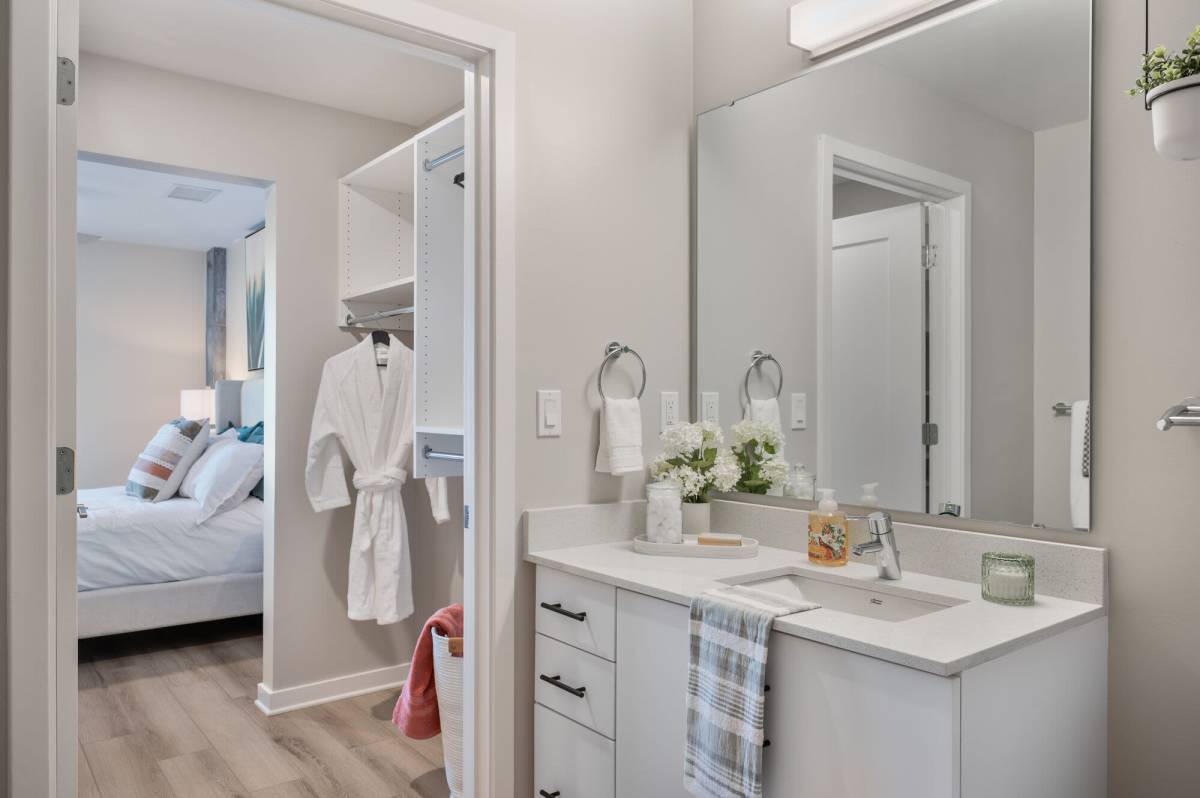 Bathroom with walk-in closet view at The Breeze in Winter Haven, Florida