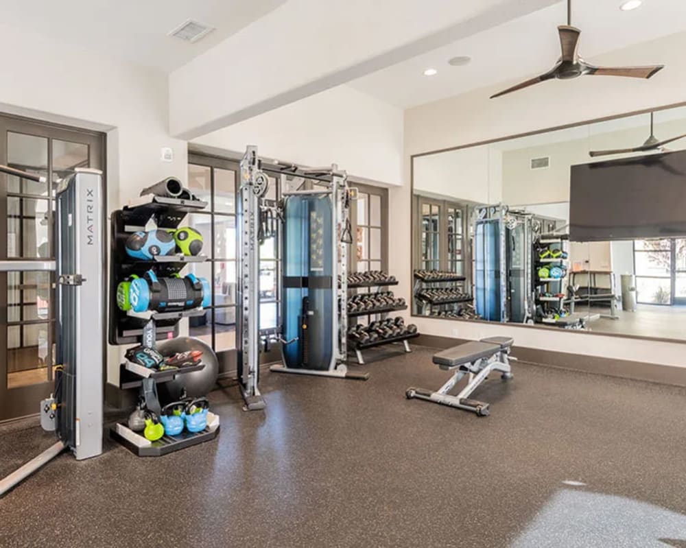 Apartments in Roseville, CA for Rent - Harvest at Fiddyment Ranch - State-Of-The-Art Fitness Center Equipped With Workout Bench, Free-Weights, Strength Training Machines, and Full-Body Mirror