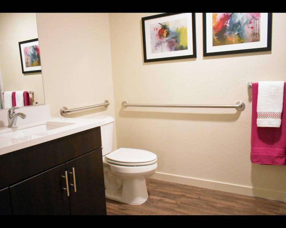 Bathroom with cabinet at Vines on 80 in Fairfield, California