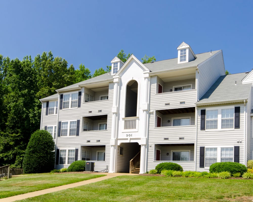 Stunning exterior view of apartments at The Pointe at Stafford Apartment Homes in Stafford, VA