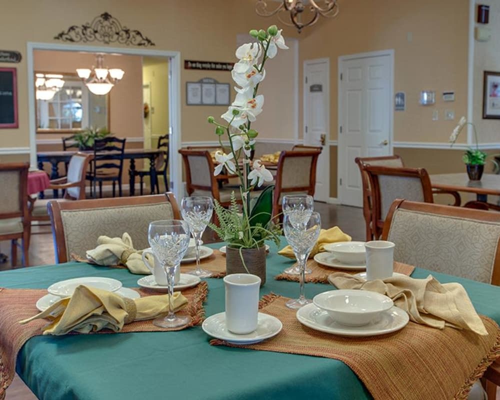 Well decorated dining area table at The Arbors at WestRidge Place Senior Living in Sikeston, Missouri