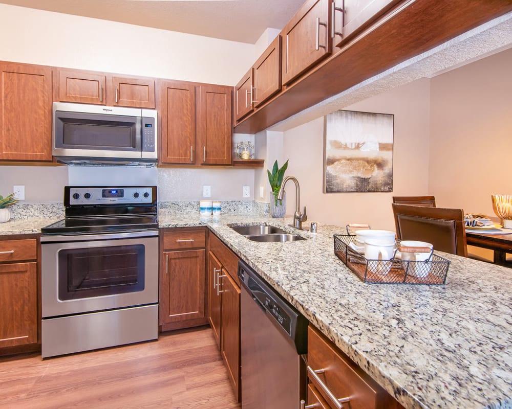 Kitchen with stainless steel appliances at Ballantyne