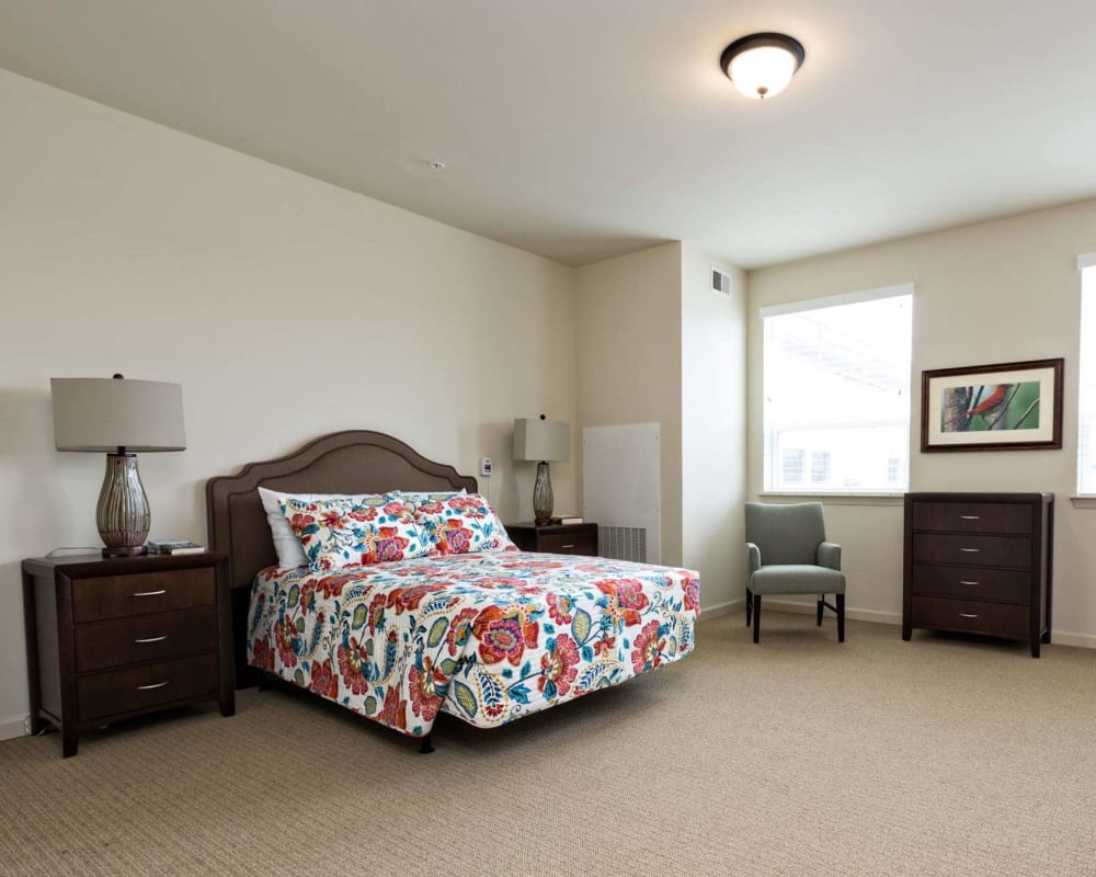 A decorated, spacious bedroom at The Harmony Collection at Hanover in Mechanicsville, Virginia