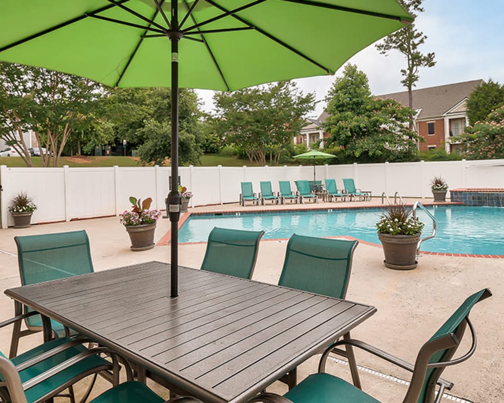 Poolside patio seating at Main Street Apartments in Huntsville, Alabama