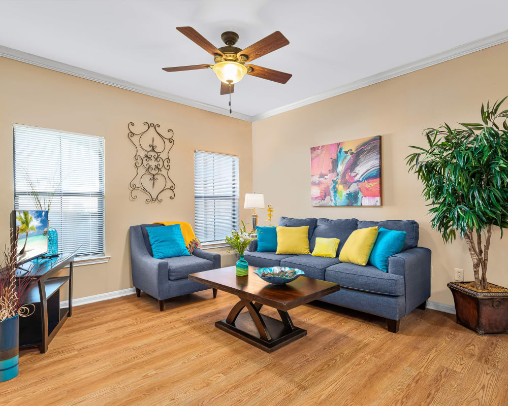 Living room with ceiling fan at Villas at Medical Center in San Antonio, Texas