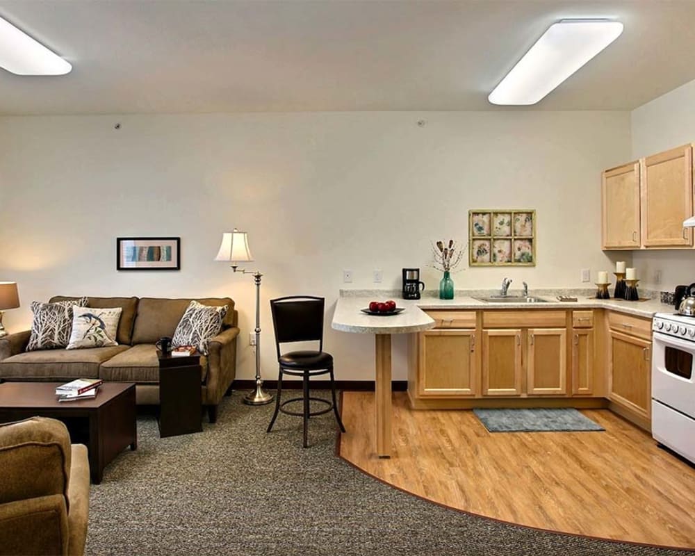 Resident apartment with a kitchen at Milestone Senior Living Woodruff in Woodruff, Wisconsin.