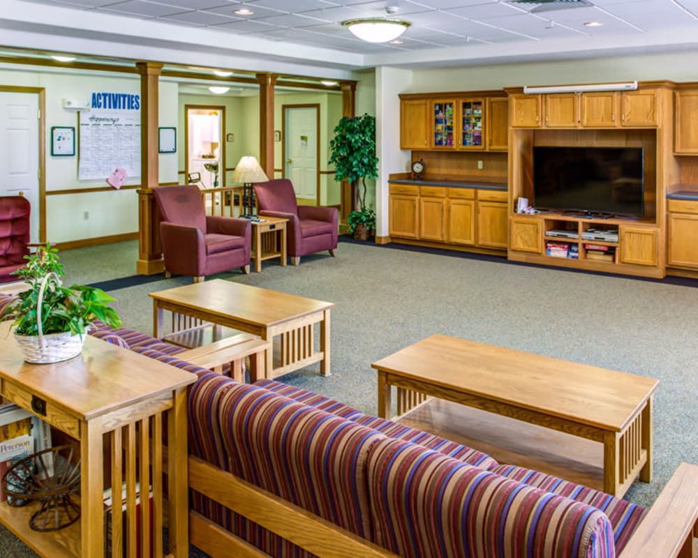 Spacious resident TV room at Prairie Hills Independence in Independence, Iowa.