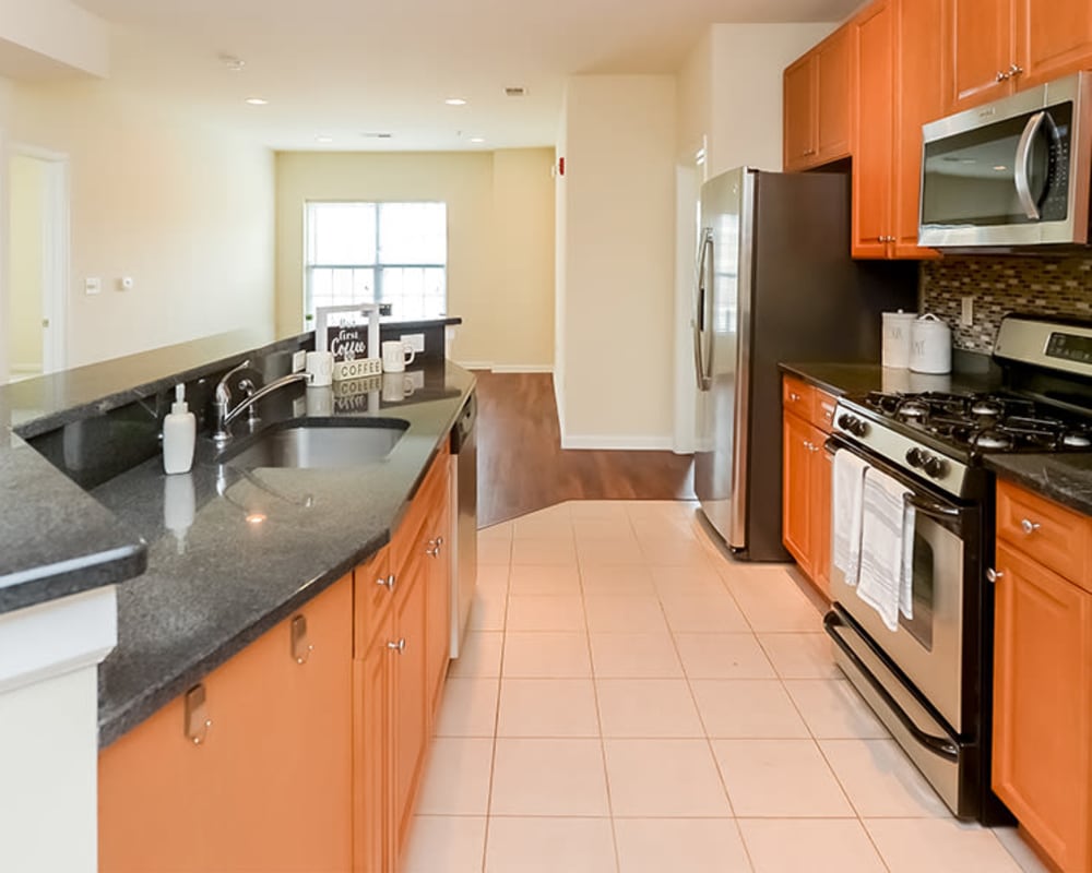 Fully equipped kitchen in a home at Cranford Crossing Apartment Homes in Cranford, New Jersey