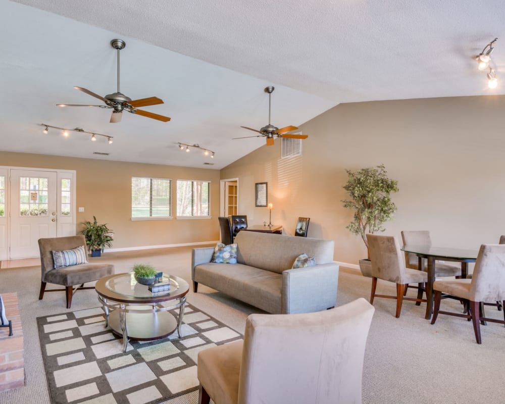 Clubhouse with ceiling fans at Woodbrook Apartment Homes in Monroe, North Carolina