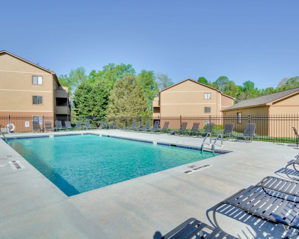 A large swimming pool for hot summer days at Woodbrook Apartment Homes in Monroe, North Carolina
