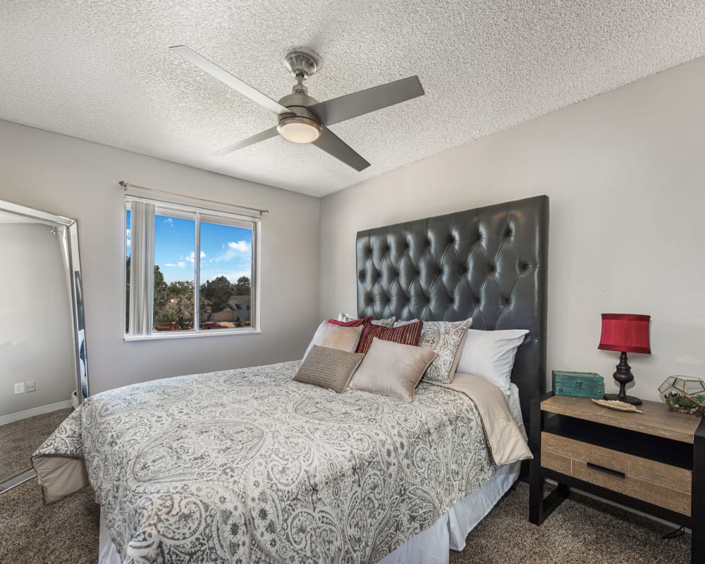 Well-lit bedroom at Florida Station Apartments in Aurora, Colorado
