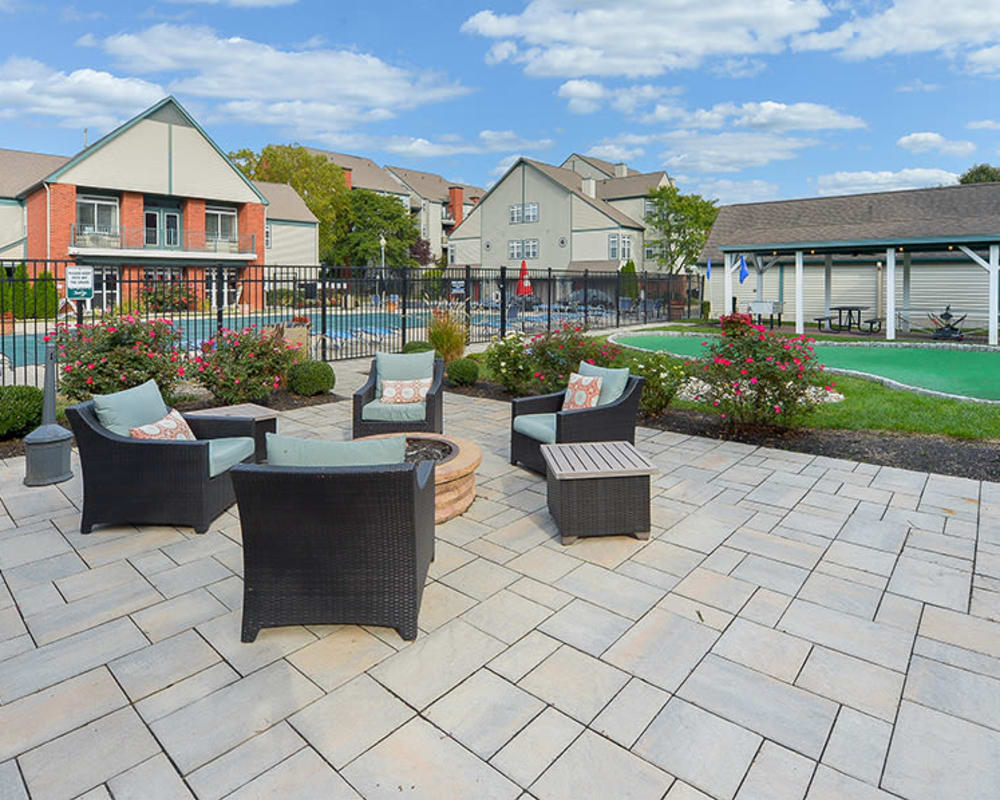 Outdoor firepit lounge at Bishop's View Apartments & Townhomes in Cherry Hill, New Jersey