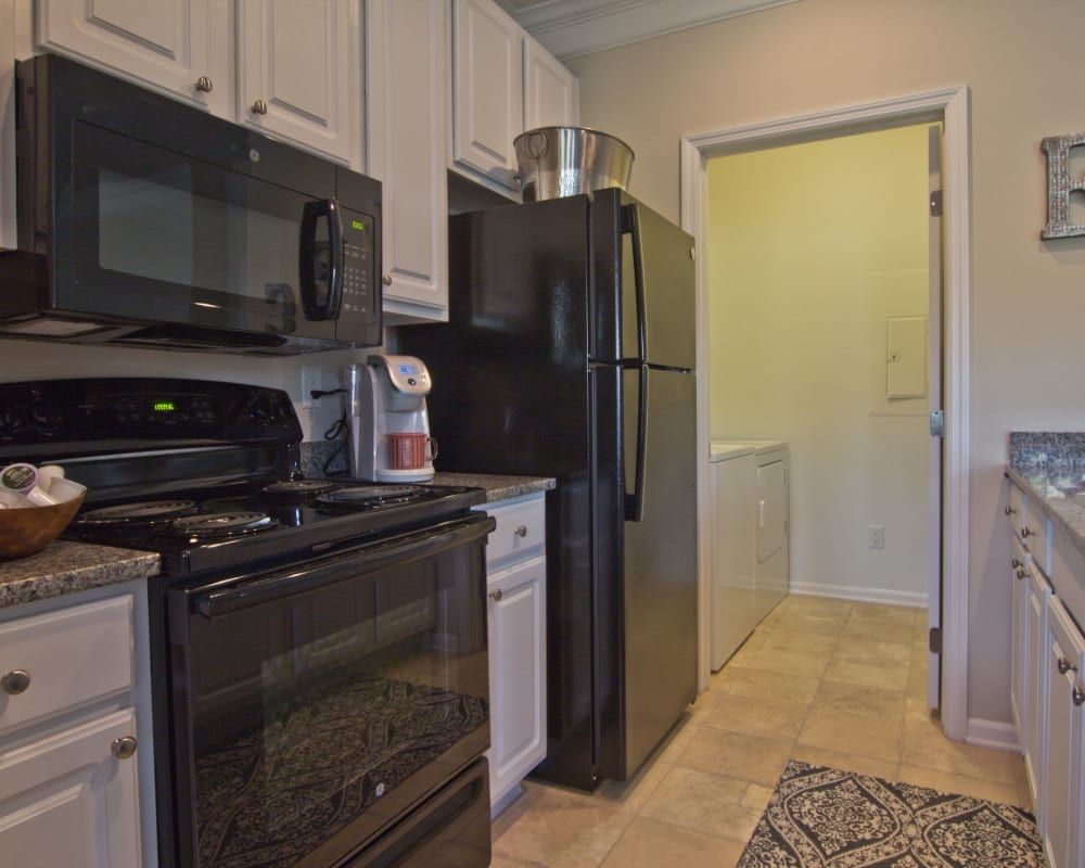 Fully equipped kitchen in a home at Easton Commons Apartments & Townhomes in Columbus, Ohio