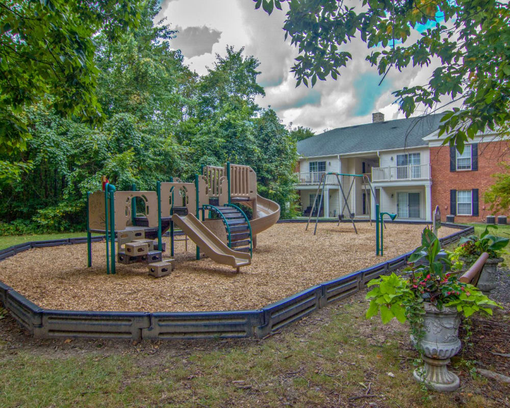 Playground at park in Westerville, Ohio at The Woods at Polaris Parkway Apartments & Townhomes
