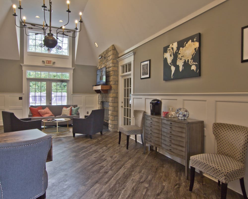 Hangout inside the clubhouse by the pool at The Woods at Polaris Parkway Apartments & Townhomes in Westerville, Ohio