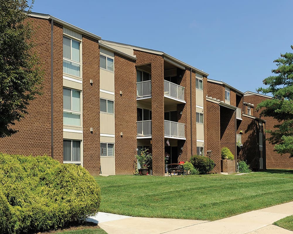 Exterior with patios and balconies at Top Field Apartment Homes in Cockeysville, Maryland