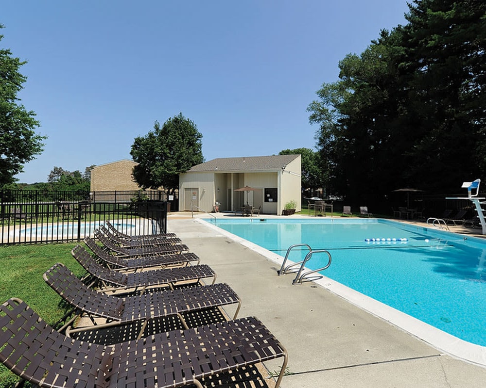 Swimming pool and lounge chairs at Top Field Apartment Homes in Cockeysville, Maryland