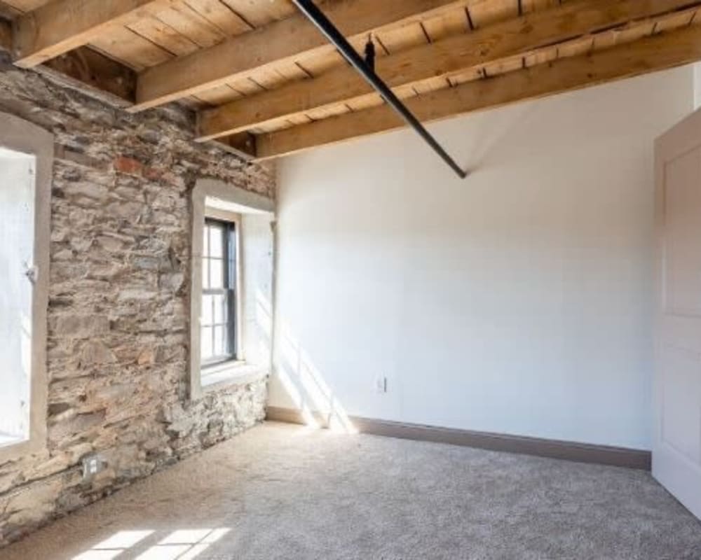 Bedroom at Lofts at Cargill Falls Mill in Putnam, Connecticut