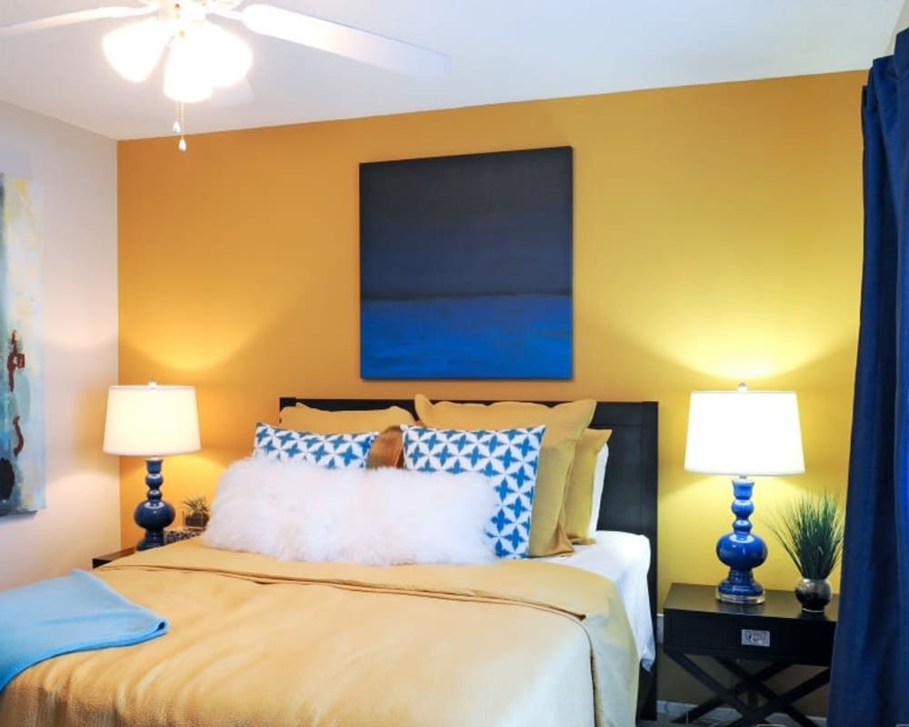 Bright model bedroom at Hampton Greene Apartment Homes in Columbia, South Carolina