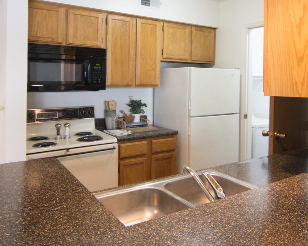 Kitchen in a home at Hidden Lakes Apartment Homes in Miamisburg, Ohio
