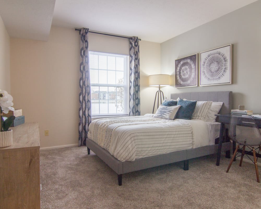 Bedroom in a home at Hidden Lakes Apartment Homes in Miamisburg, Ohio