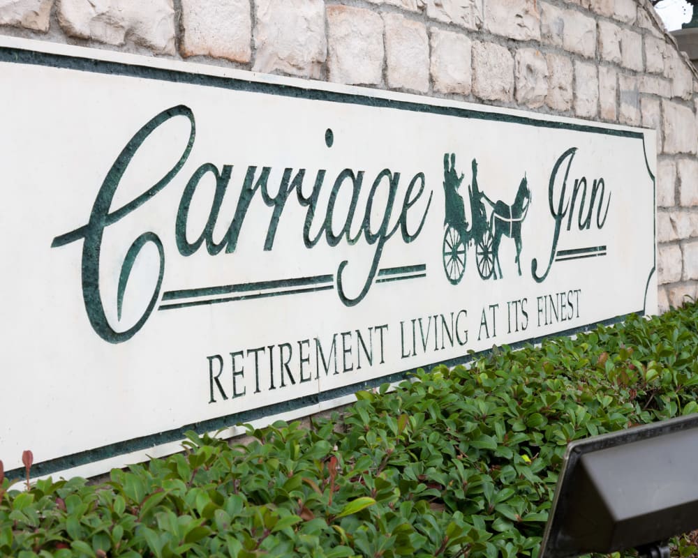 Signage for Carriage Inn Katy in Katy, Texas