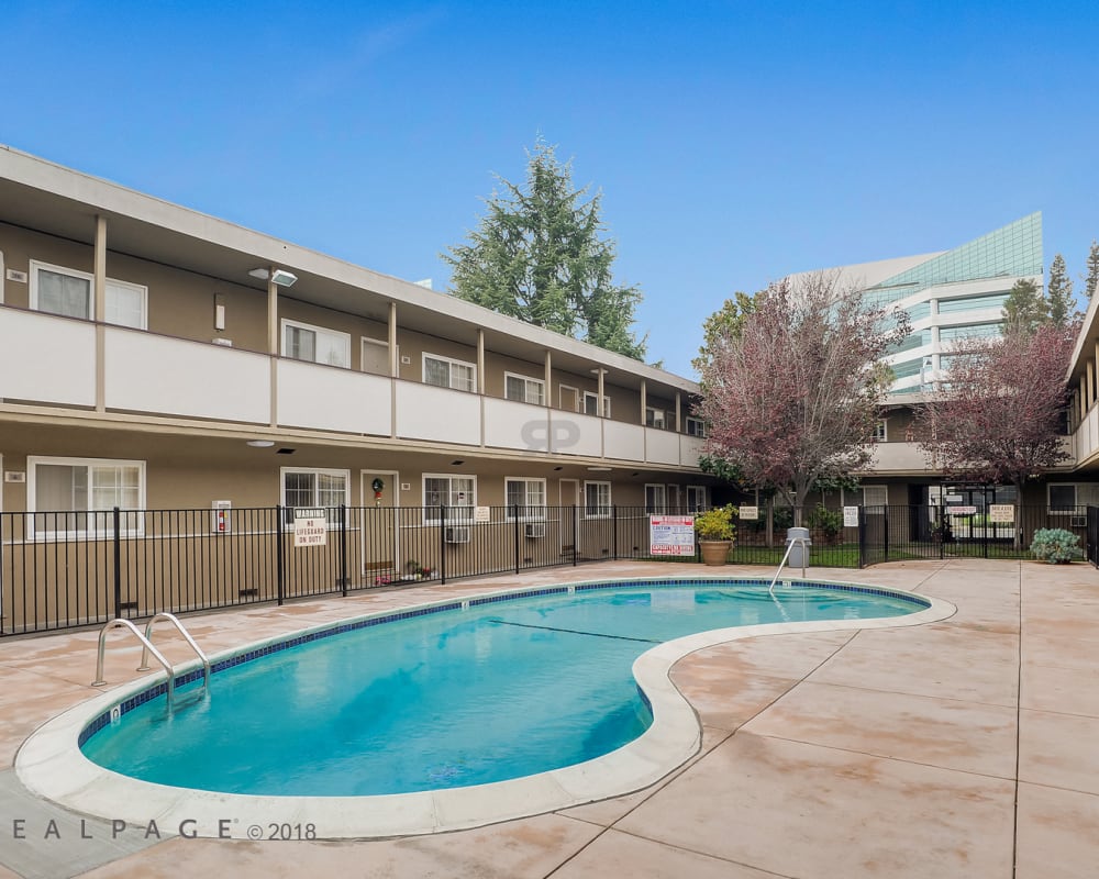 Outdoor swimming pool at City Walk Apartments in Concord, California