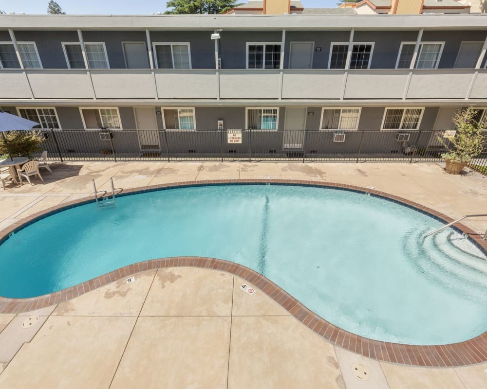 Curved swimming pool at City Walk Apartments in Concord, California