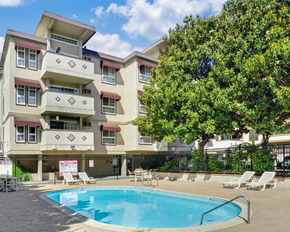 Balconies overlooking outdoor pool at Palace Apartments in Concord, California