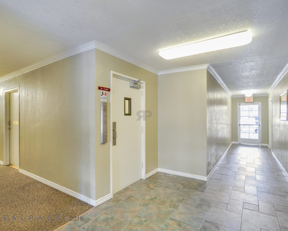 Brightly lit interior entrance at Palace Apartments in Concord, California