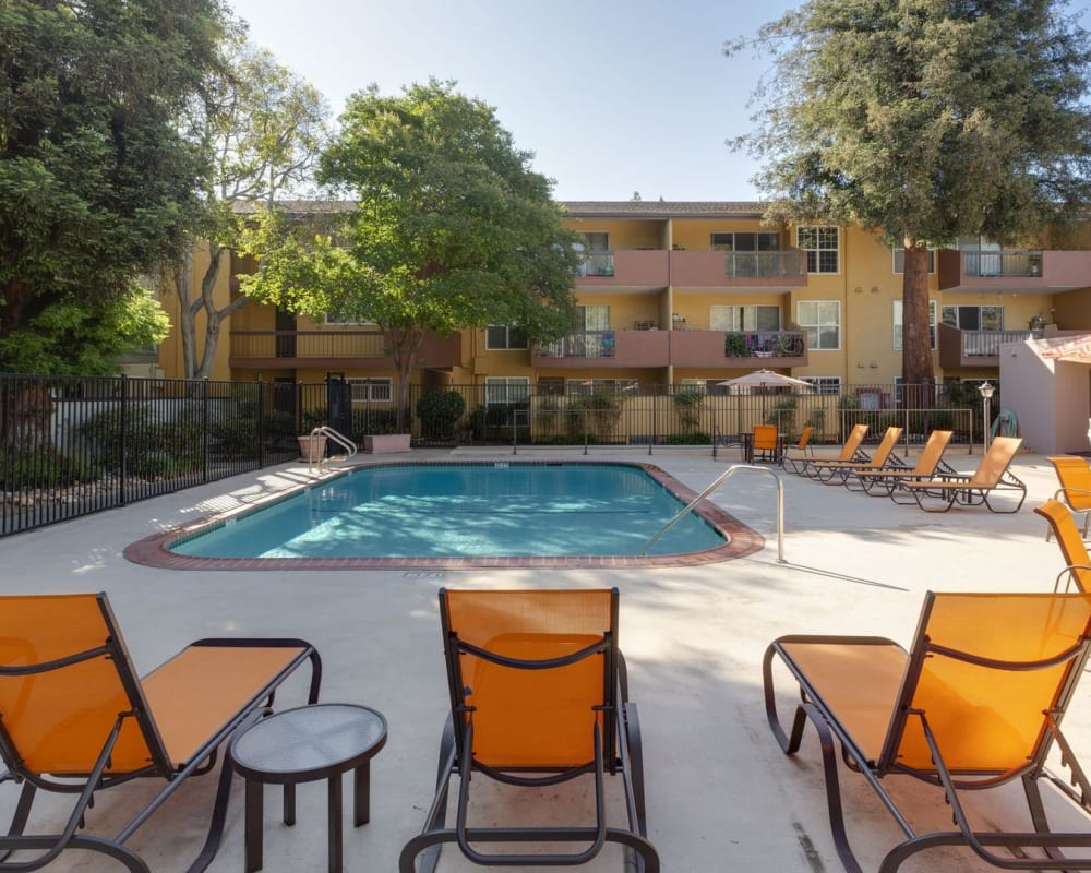 Lounge chairs by the pool at Redwood Plaza in Fremont, California