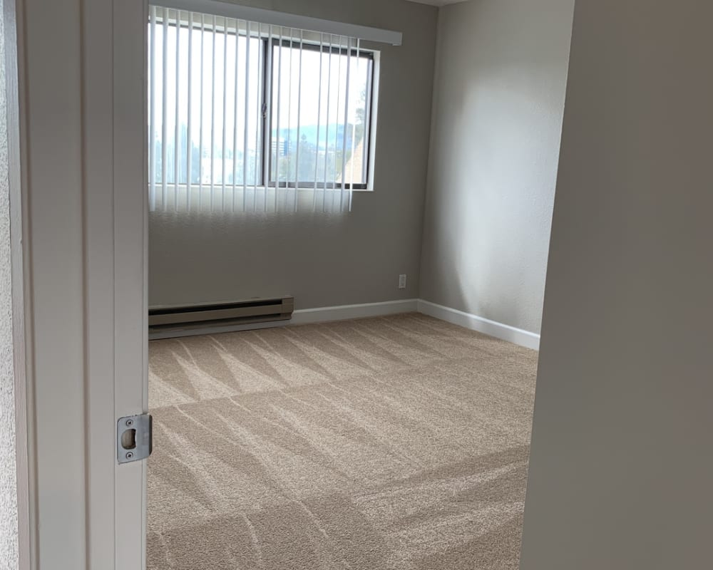 Model bedroom with carpet at Broadway Towers in Concord, California
