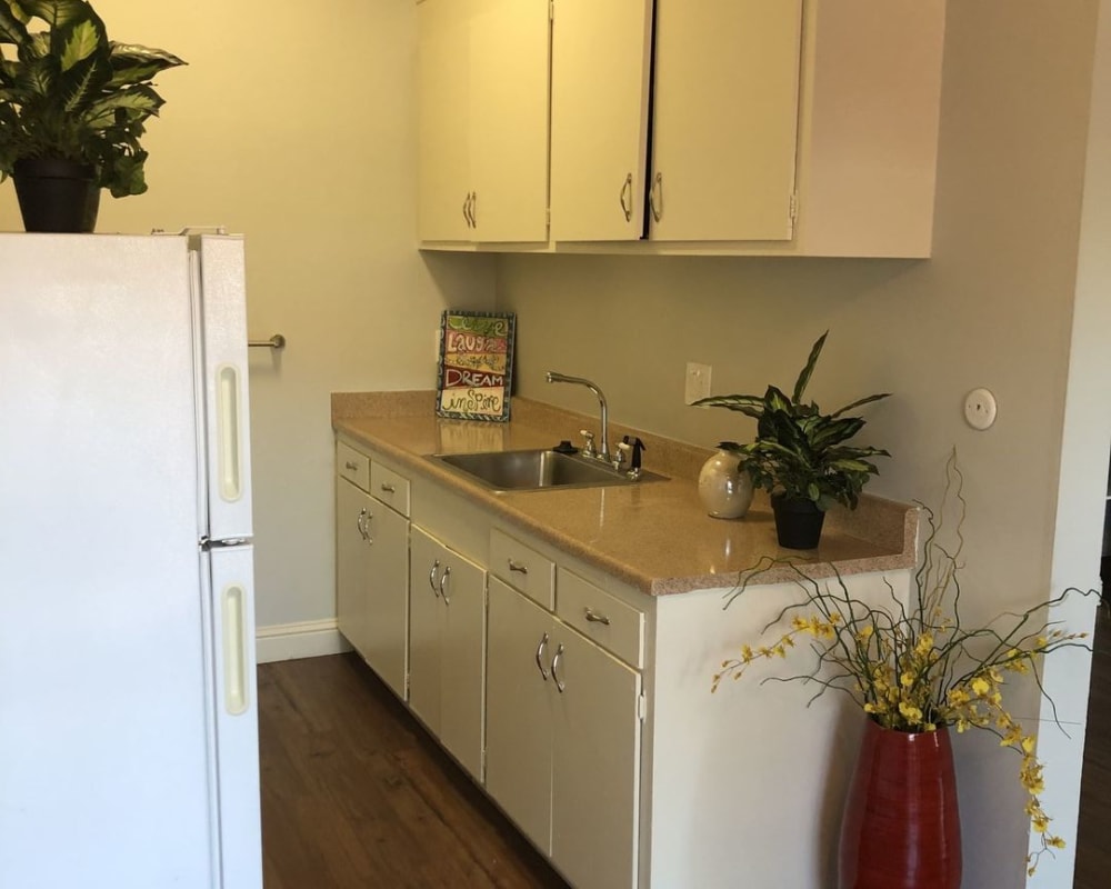 Kitchen with updated countertops at Pennsylvania Apartments in Fremont, California
