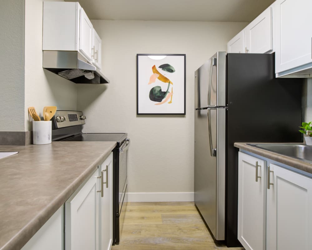 Resident with young daughter at Terra Apartment Homes in Federal Way, Washington