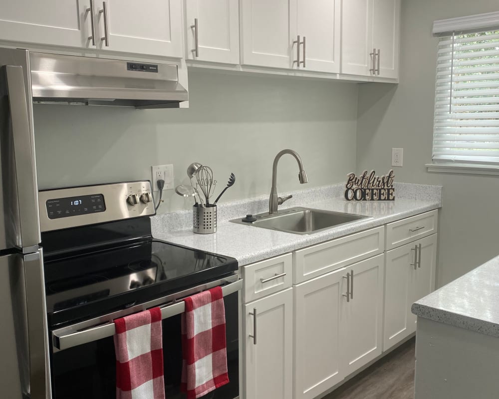 Kitchen with wood floors  at Pennsylvania Apartments in Fremont, California