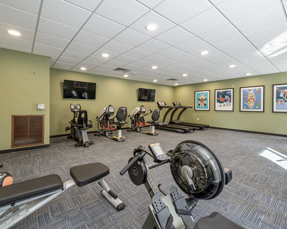 Resident fitness center with cardio equipment at The Pillars of Grand Rapids in Grand Rapids, Minnesota